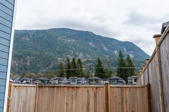 Mountain view with a heavily wooded area | Image 15