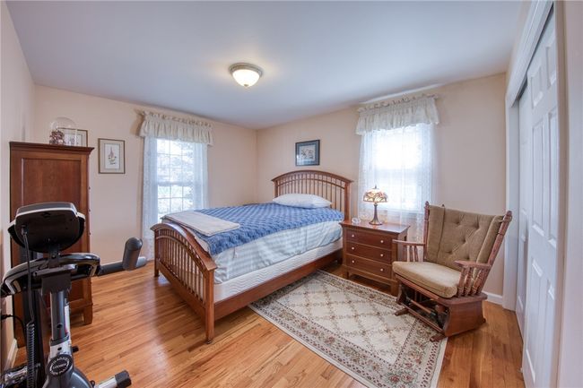 Bedroom with hardwood floors | Image 18