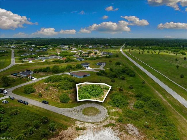 Aerial view of property and surrounding area with property parcel outlined | Image 6