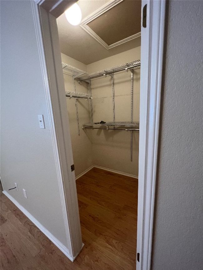 Primary bedroom walk in closet | Image 29