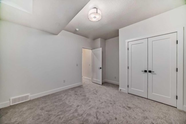 176 Lissington Drive Sw, Home with 4 bedrooms, 3 bathrooms and 2 parking in Calgary AB | Image 43