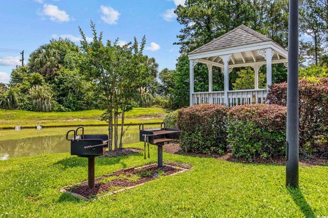 View of green lawn with a gazebo | Image 29
