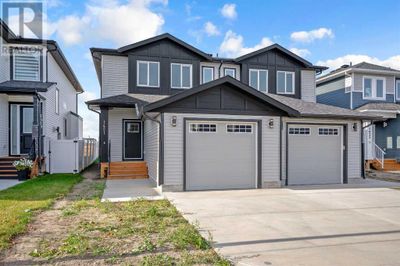 1421 Aldrich Pl, Home with 3 bedrooms, 3 bathrooms and 2 parking in Carstairs AB | Image 2