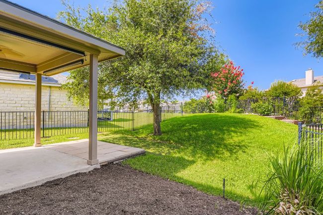 Fenced backyard featuring a patio | Image 30