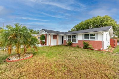 10404 Loquat Drive, House other with 2 bedrooms, 2 bathrooms and null parking in Port Richey FL | Image 2