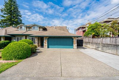 7739 117 St, Home with 4 bedrooms, 3 bathrooms and 10 parking in Delta BC | Image 1