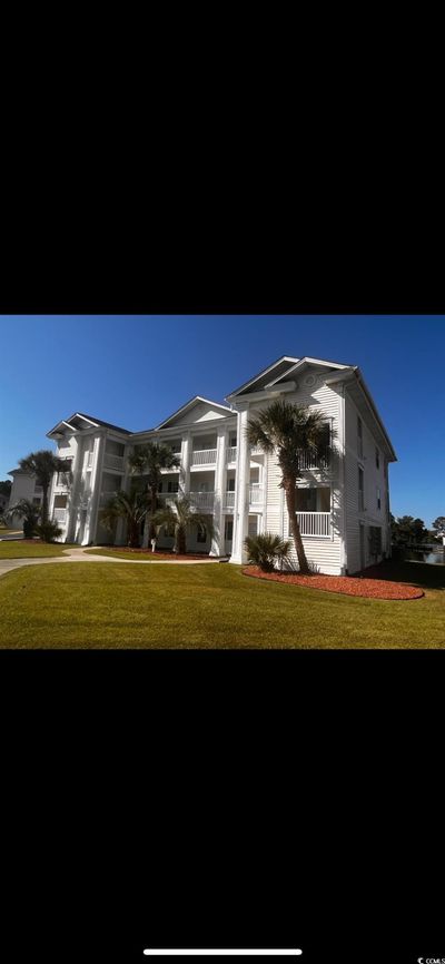 View of front of house featuring a front lawn | Image 2