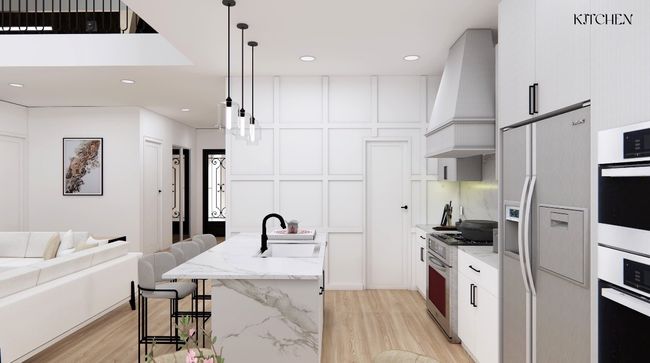 Kitchen featuring fridge with ice dispenser, a breakfast bar, stainless steel gas range oven, premium range hood, and a sink | Image 15