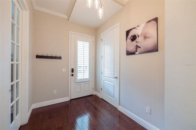 Foyer with Half Bath and Coat Closet | Image 3