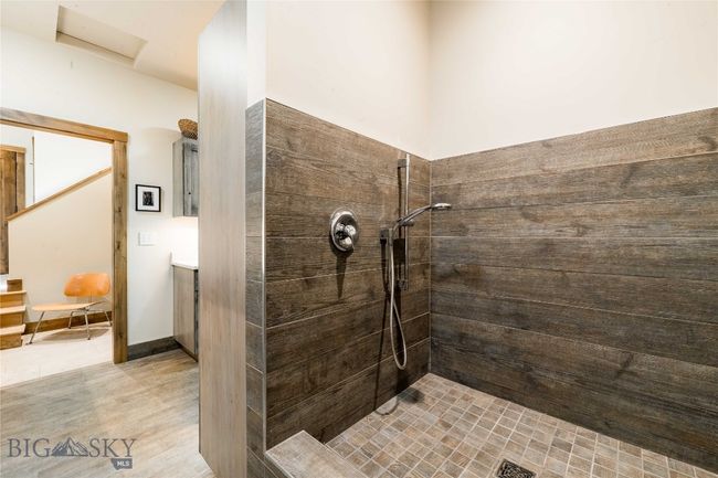 The laundry room has an exterior door so the dogs can come straight inside to the luxurious dog wash. | Image 35