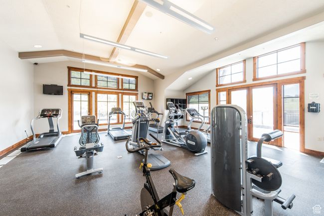 Workout area with recessed lighting and vaulted ceiling | Image 57