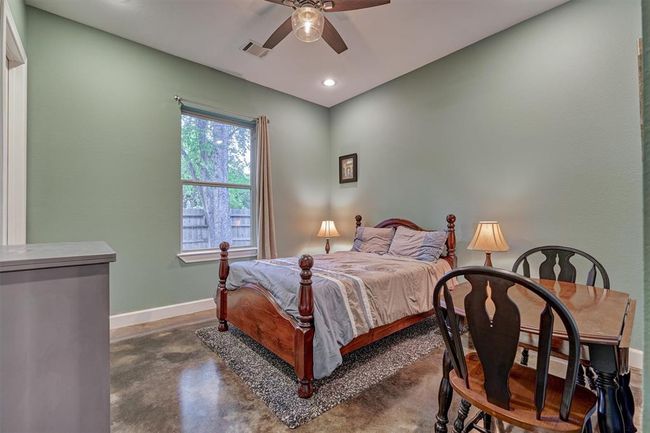 The second guest bedroom is generously sized and offers the comfort and privacy of its own en-suite bath—perfect for visiting family or long-term guests. | Image 15