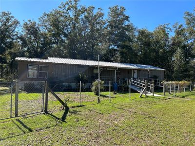 8650 Ne 106 Th Street, House other with 3 bedrooms, 2 bathrooms and null parking in BRONSON FL | Image 1