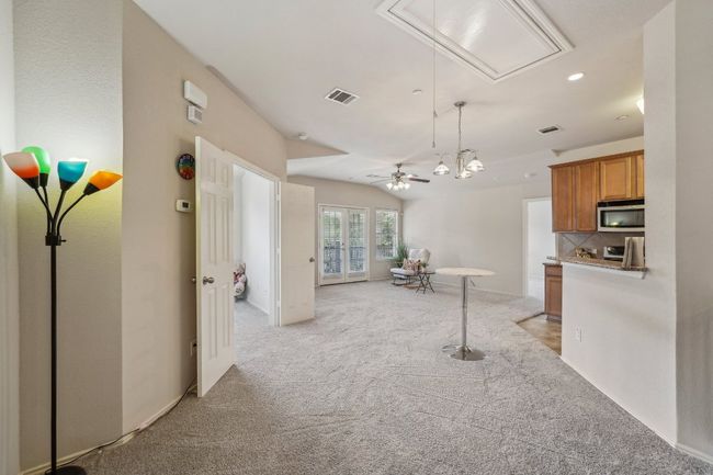 Stylish & Functional – Granite countertops, modern appliances, and ample cabinetry make this kitchen a joy to use. | Image 11