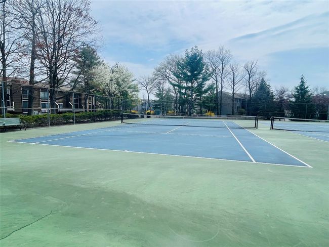 View of sport court featuring fence | Image 29