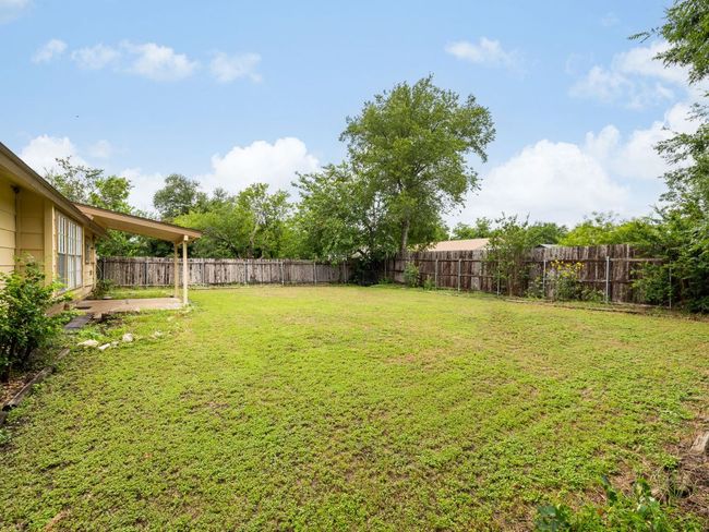 Fenced backyard featuring a patio area | Image 23