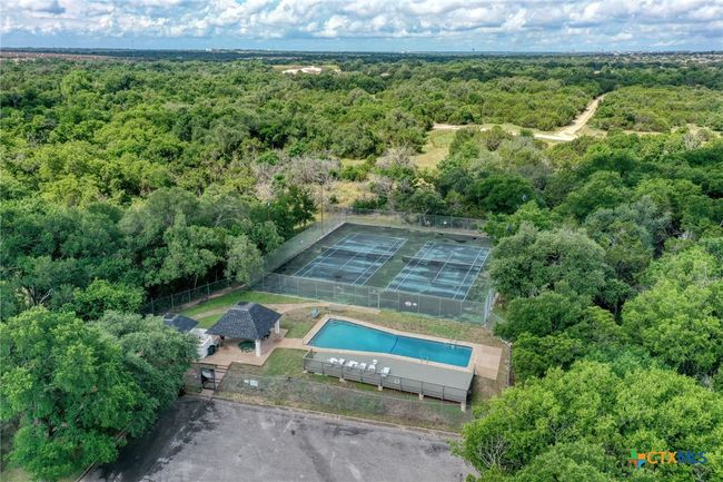 Aerial view of Shadowbrook HOA amenities with pool, pavilion and tennis courts. | Image 39