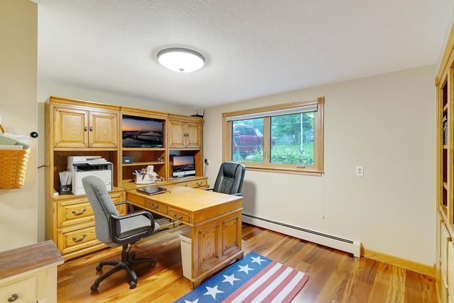 Beautiful, high quality cabinets with built-in desk. | Image 29