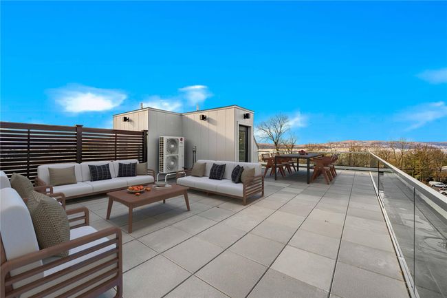 Private Rooftop Terrace w/ Views of the Hudson River, Palisades & Dobbs Ferry - Virtually Staged | Image 21