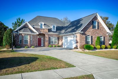 View of front of property featuring a front yard | Image 1