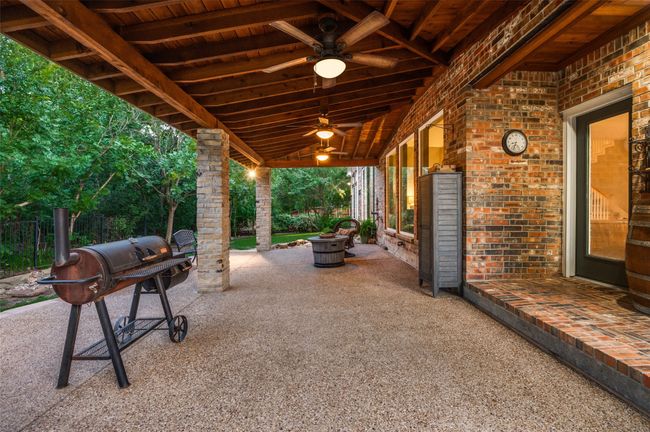 Showcasing the huge size of the back patio, with gorgeous cedar cover | Image 7
