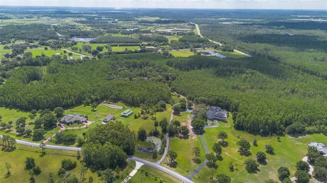 11933 Pasco Trails Blvd, House other with 4 bedrooms, 3 bathrooms and null parking in SPRING HILL FL | Image 48