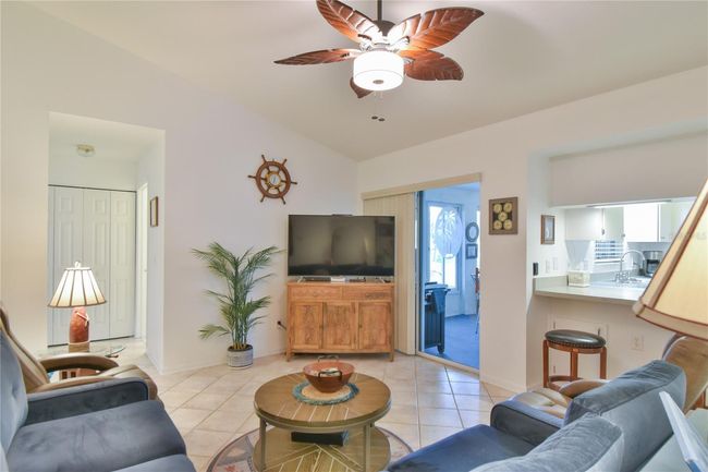 Family Room with View of the Florida Room and Kitchen | Image 11