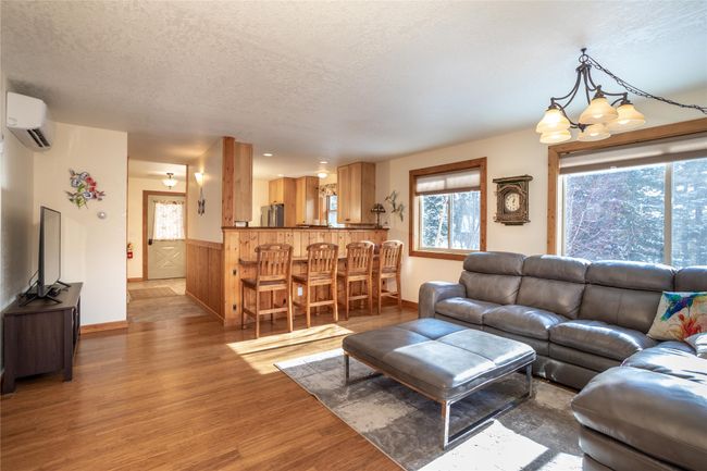 Living room looking towards kitchen | Image 47
