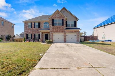 front of home | Image 1