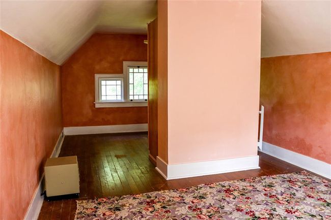 The third floor bonus room, with a central cabinet | Image 38