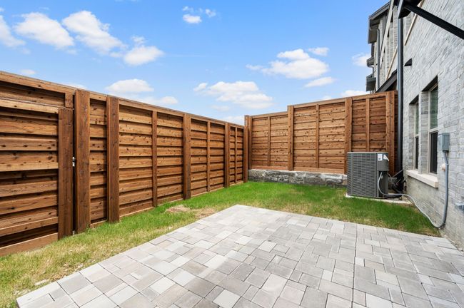 Not too much and not too little! This lovely fenced yard and paver patio are the perfect size for you to relax and enjoy. | Image 6