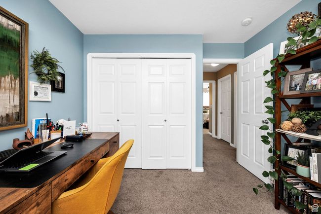 Bedroom being used as a home office with carpet flooring and closet | Image 18
