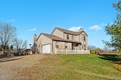 10495 Gordon Road, Home with 3 bedrooms, 2 bathrooms and null parking in Tyrone Twp MI | Image 2