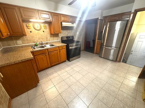 609 Linden Ave, Bellwood, IL, 60104-1856 | Card Image