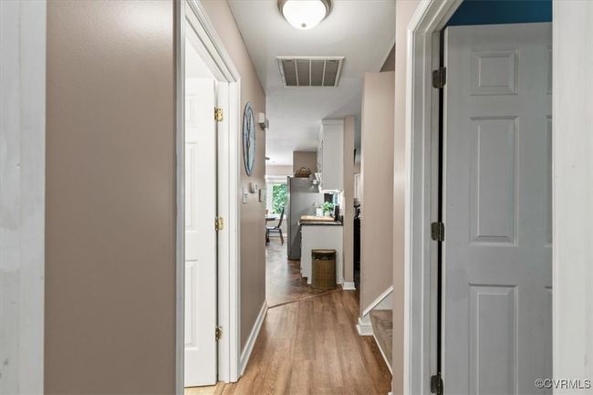 Hall featuring light wood-type flooring and baseboards | Image 27