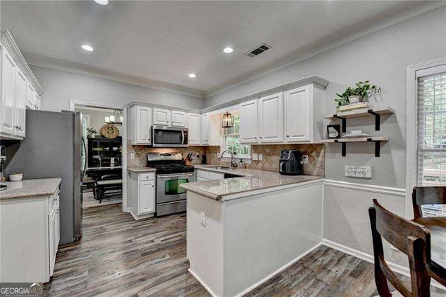5574 Wynhall Dr, House other with 4 bedrooms, 3 bathrooms and null parking in Peachtree Corners GA | Image 14