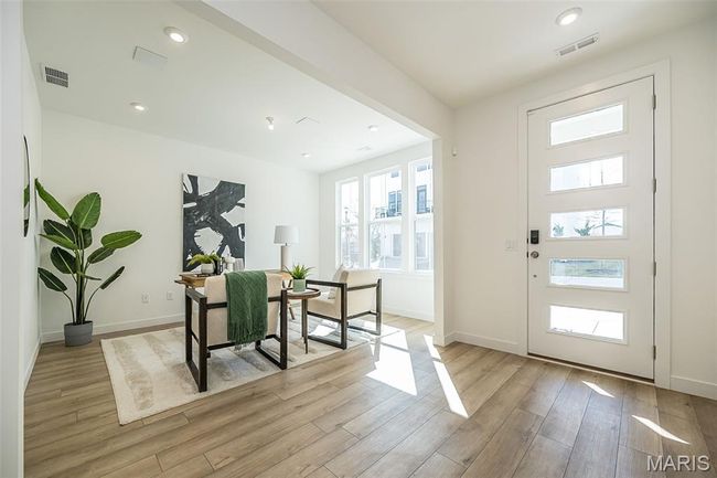 Foyer featuring light wood-style floors and recessed lighting | Image 32