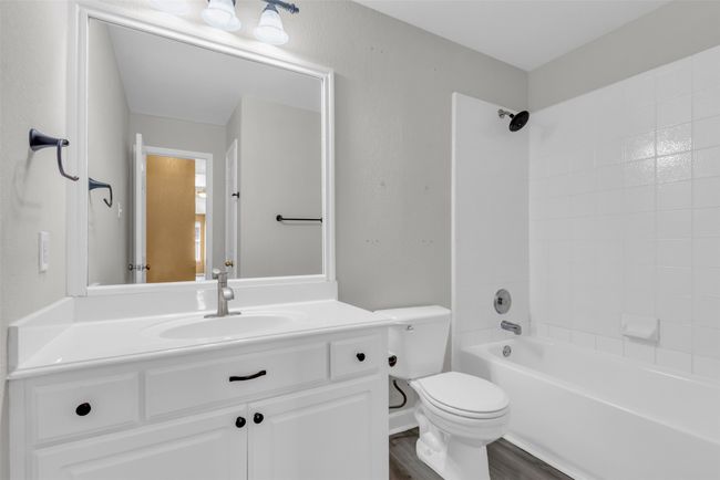 Full bath featuring vanity. | Image 23