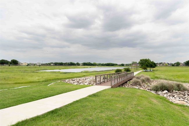 View of property's community featuring a yard and a water view | Image 29