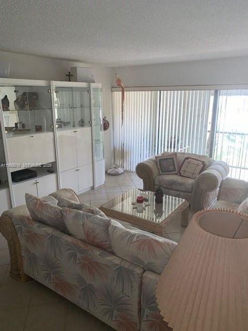 206-303 Racquet Club Rd, Weston, FL, 33326-1104 | Card Image