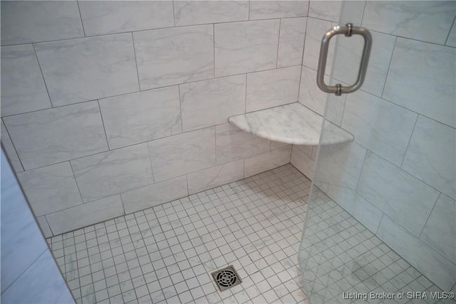 Main bathroom custom shower with corner seat | Image 20
