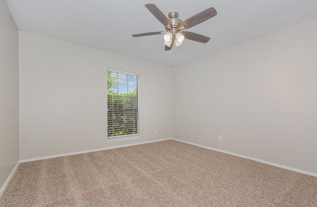 Spare room with carpet floors and ceiling fan | Image 13