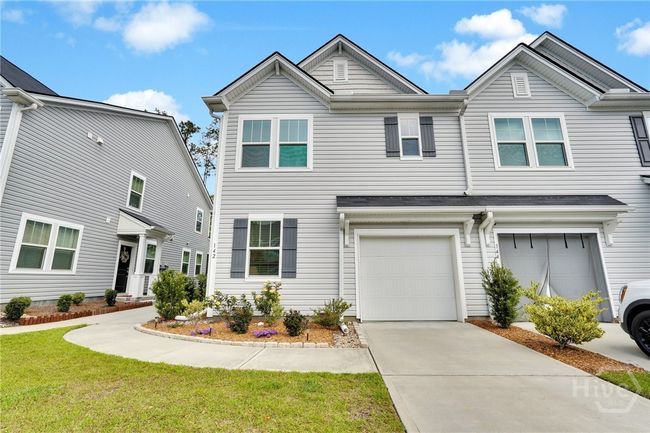 One car garage with space on the driveway to park as well. | Image 4