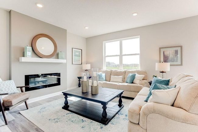 Another view of the living room. Photo of model home, color & options will vary. | Image 8