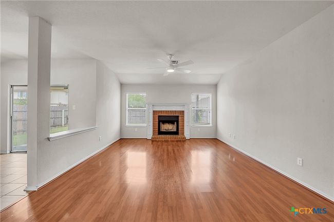 Plant ledge/ pony wall overlooks the liviing area and provides the ample display space you can enjoy from the living or dining area! | Image 7