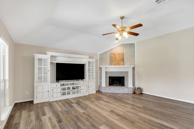 Warm & Inviting Family Room (Den) with vaulted ceiling | Image 16
