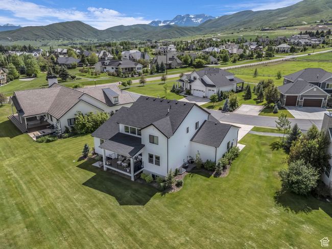 Aerial view of residential area featuring a mountain backdrop | Image 55