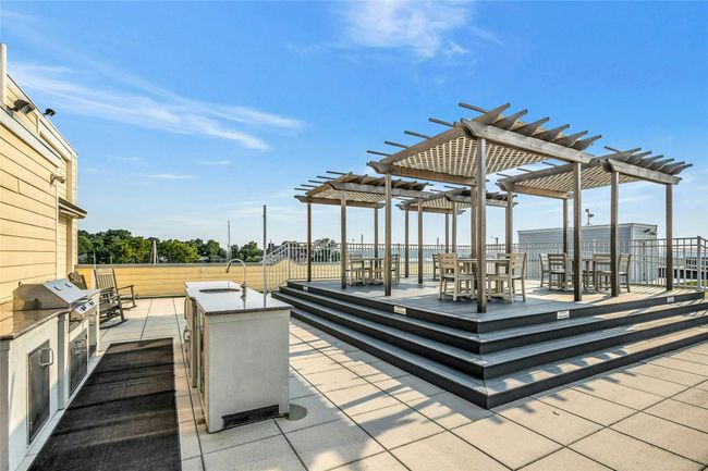 View of patio / terrace with a pergola and a sink | Image 26