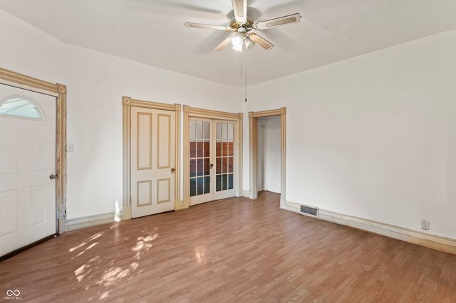 Family Room with view into Second Bedroom and Hallway | Image 11