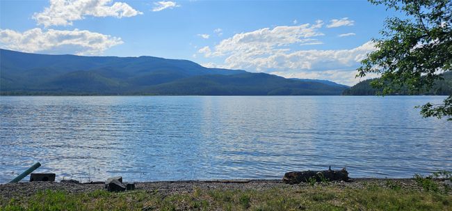 Water view with a mountainous background | Image 7